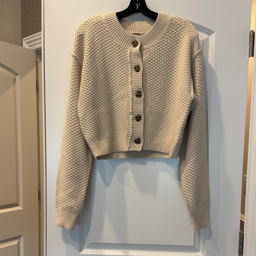 Free People cream cotton cropped cardigan, size small.